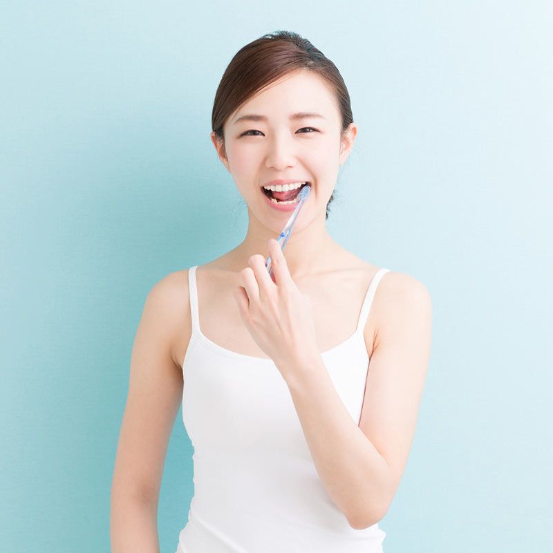 Woman Brushing Teeth Woman Brushing Teeth